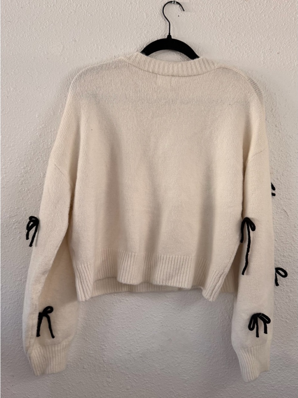 Cream Cardigan Sweater with Black Bow Accents - Picture 2 of 3